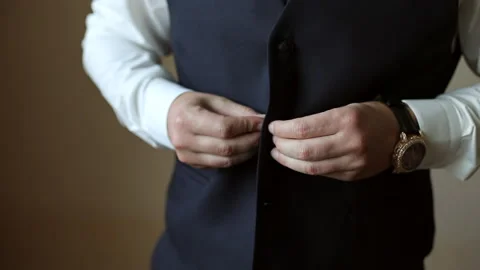 Young businessman gets dressed. Dressing suit. Stock Footage 167606256