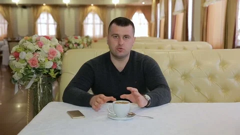 Young Businessman Giving Interview To The Camera Stock Footage 72951871