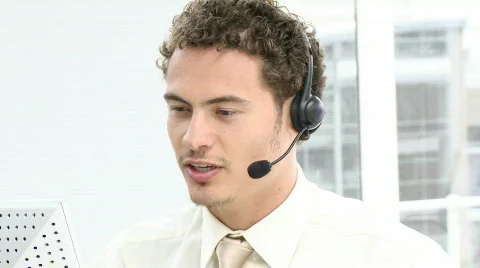 Young businessman with headset on Stock Footage