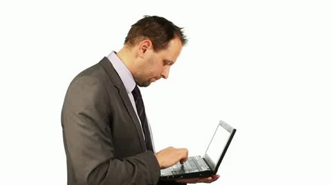 Young businessman with laptop, isolated on white Stock Footage