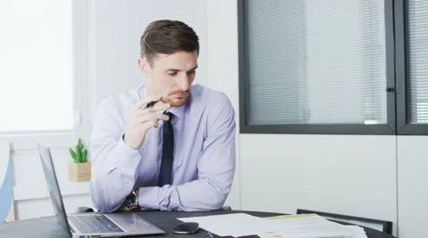 Young businessman lost in thought Stock Footage 68402370