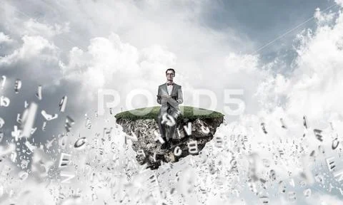 Young businessman or student studying the science and symbols fl Stock Photos
