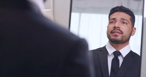 Young businessman practicing his speech in front of mirror at home. Stock Footage 270505412