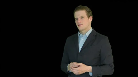 Young businessman presenting an object or an idea Stock Footage 40960479