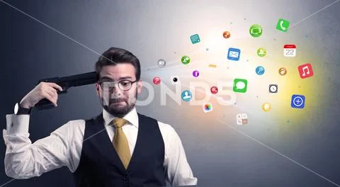 Young businessman shooting his head with gun Stock Photos
