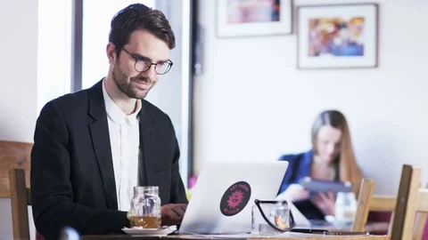 Young Businessman Smiling During Work Stock Footage 71604150