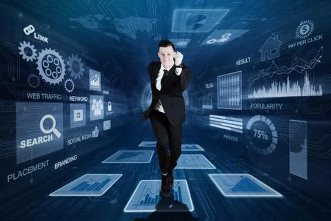 Young businessman sprinting inside binary code Stock Photos