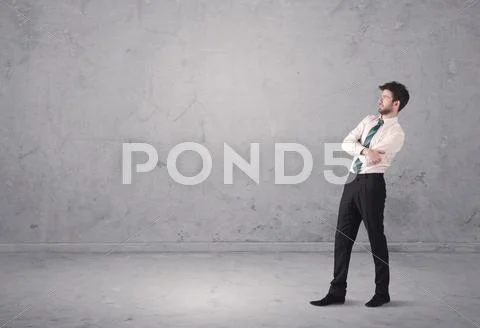 Young businessman standing confused Stock Photos