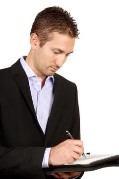 Young businessman taking notes Stock Photos