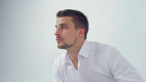 Young businessman is thinking how to solve problems close up Video stock 83597624
