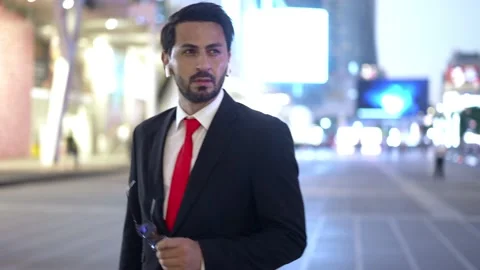 Young businessman thinking to solving business problem on street Stock Footage 188826342