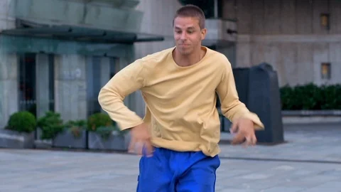 Young Businessman Throws Himself In Breakdance Moves Stock Footage 87711287