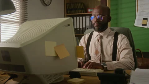 Young Businessman Typing on Retro Computer in Office Stock Footage 341416472