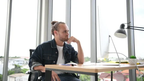 Young Businessman using computer and analysing. Stock Footage 141979815