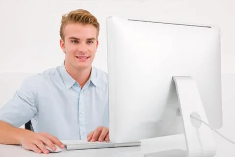 Young businessman using computer Stock Photos
