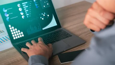 Young businessman using laptop computer for work Stock Photos