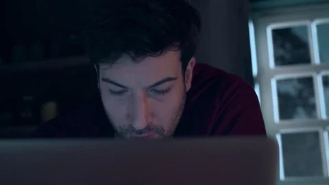 Young businessman using laptop Stock Footage 74407249