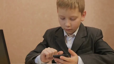 Young businessman using a smartphone 動画素材 73563609