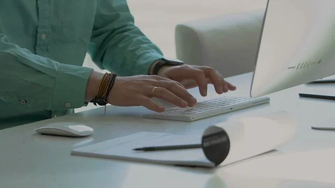 Young businessman working on computer Stock Footage 104321956