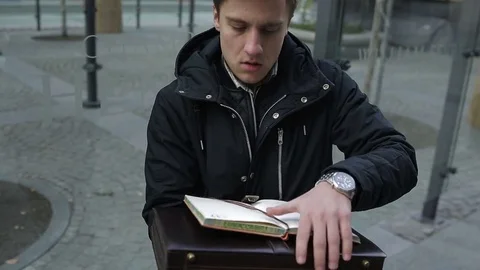 Young businessman in working drab routine. Depressed Man Nervously Looking In Stock Footage 73043023