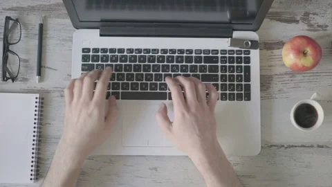 Young businessman working on laptop Stock Footage 79443784
