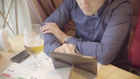 Young businessman working on the tablet Stock Footage 72617633