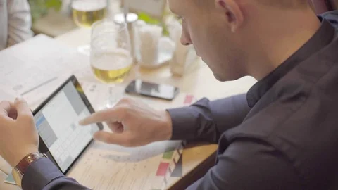 Young businessman working on the tablet Stock Footage 72617950