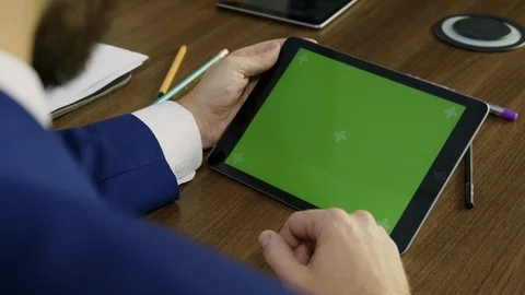 Young businessman working on a tablet. Stock Footage 101944457
