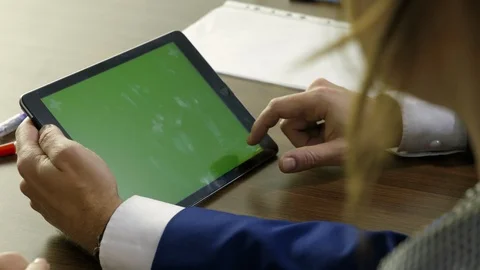 Young businessman working on a tablet. Stock Footage 101972349