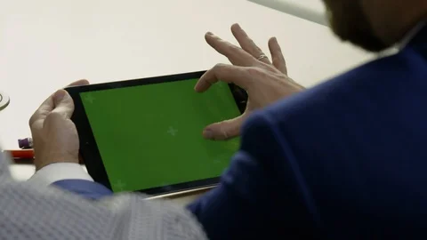 Young businessman working on a tablet. Stock Footage 101975910