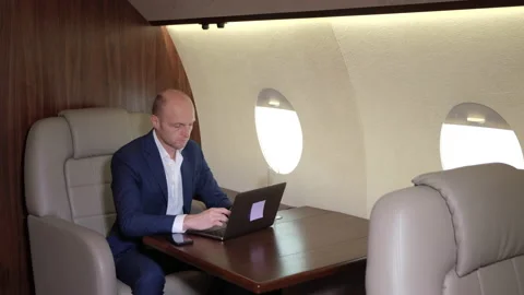 Young Businessman Working Using a Computer Laptop Stock Footage 135592879
