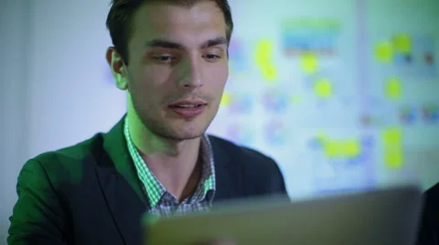 Young businessmen work even at night Stock Footage 62549971