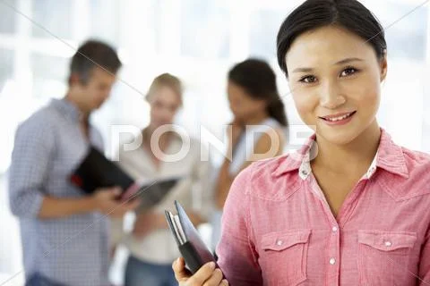 Young businesswoman in office Stock Photos