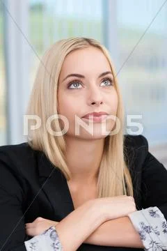 Young businesswoman planning her strategy Stock Photos