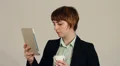 Young businesswoman using a tablet computer HD Footage