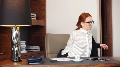 Young businesswoman using tablet computer in hotel room. Stock Footage 83864021