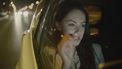 Young Businesswoman Using a Tablet Computer in the Moving Car Stock Footage 97952219