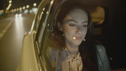 Young Businesswoman Using a Tablet Computer in the Moving Car Stock Footage 97952456
