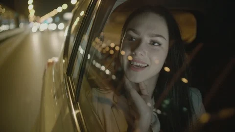 Young Businesswoman Using a Tablet Computer in the Moving Car Stock Footage 97952725