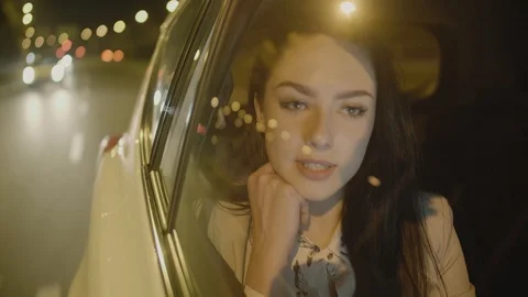 Young Businesswoman Using a Tablet Computer in the Moving Car Stock Footage 97952872