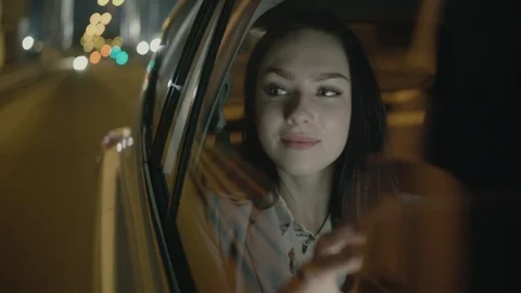 Young Businesswoman Using a Tablet Computer in the Moving Car Stock Footage 97953875