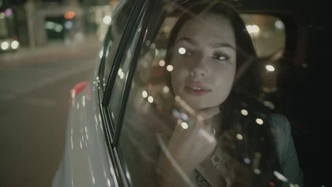 Young Businesswoman Using a Tablet Computer in the Moving Car Stock Footage 97957050