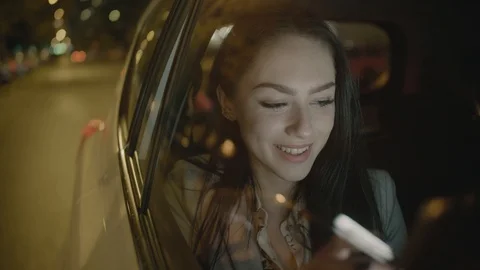 Young Businesswoman Using a Tablet Computer in the Moving Car Stock Footage 97994675
