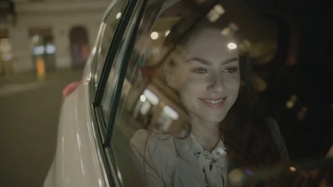 Young Businesswoman Using a Tablet Computer in the Moving Car Stock Footage 98028970