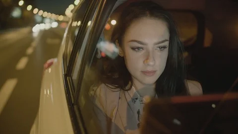 Young Businesswoman Using a Tablet Computer in the Moving Car Stock Footage 98030764