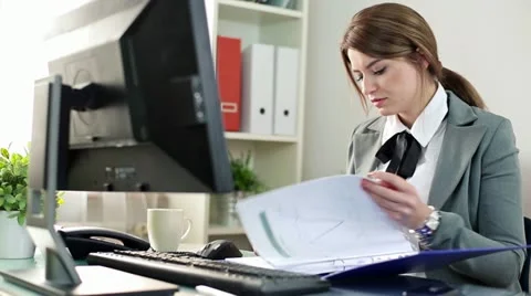 Young businesswoman working on computer in the office HD Stock Footage