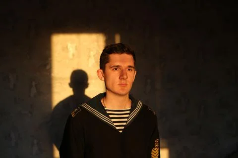 A young cadet in a naval uniform. Portrait. Sailor. 写真素材