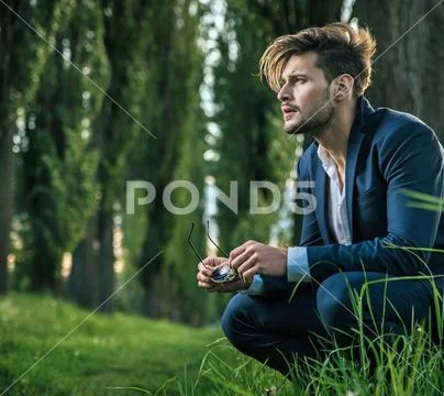 Young, calm man enjoying the summer time Stock Photos