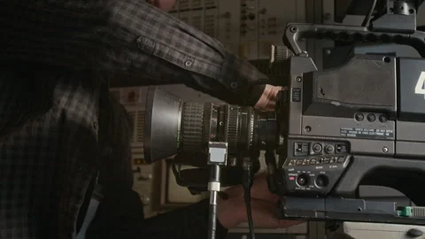 Young Cameraman Preparing Equipment to Broadcast News Report in TV Van Stock Footage 300398061
