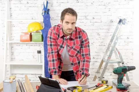 Young carpenter in his workshop Stock Photos